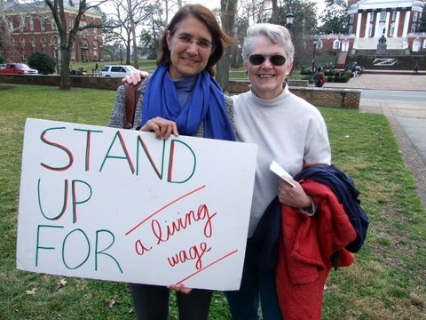 Women with Living Wage sign